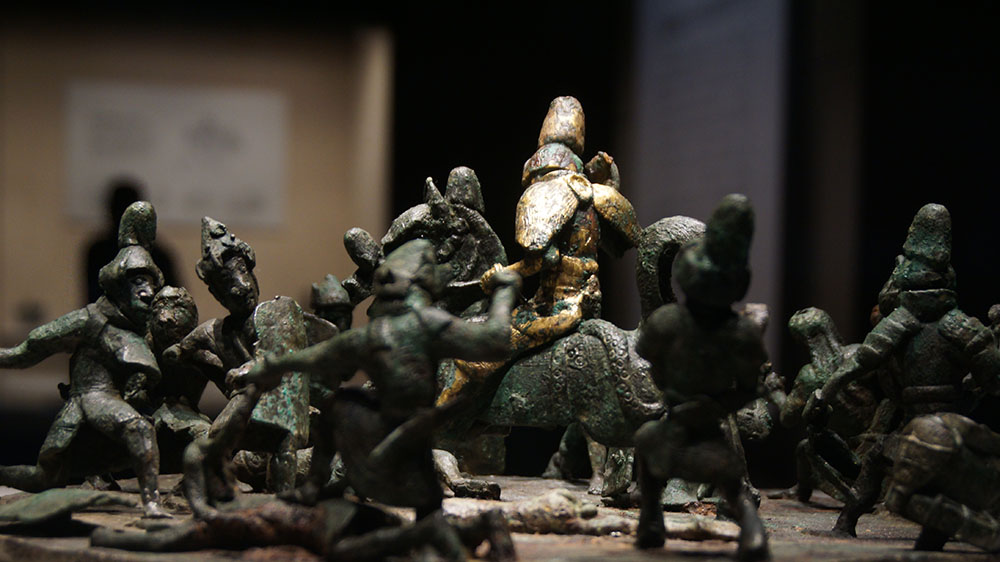 战争场面铜贮贝器盖